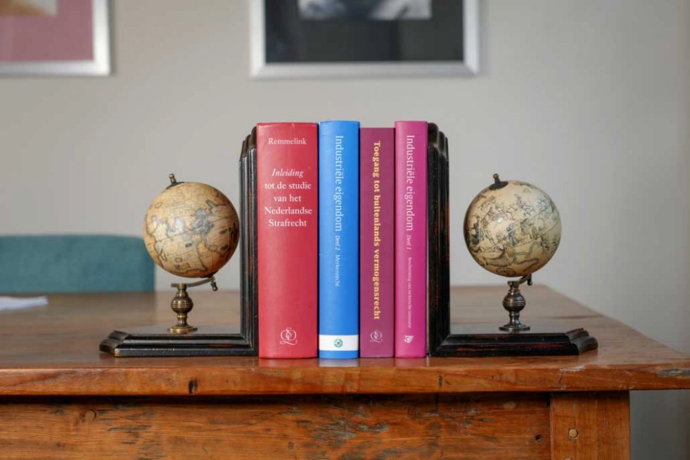 Globe bookends (replica) with historical cartography